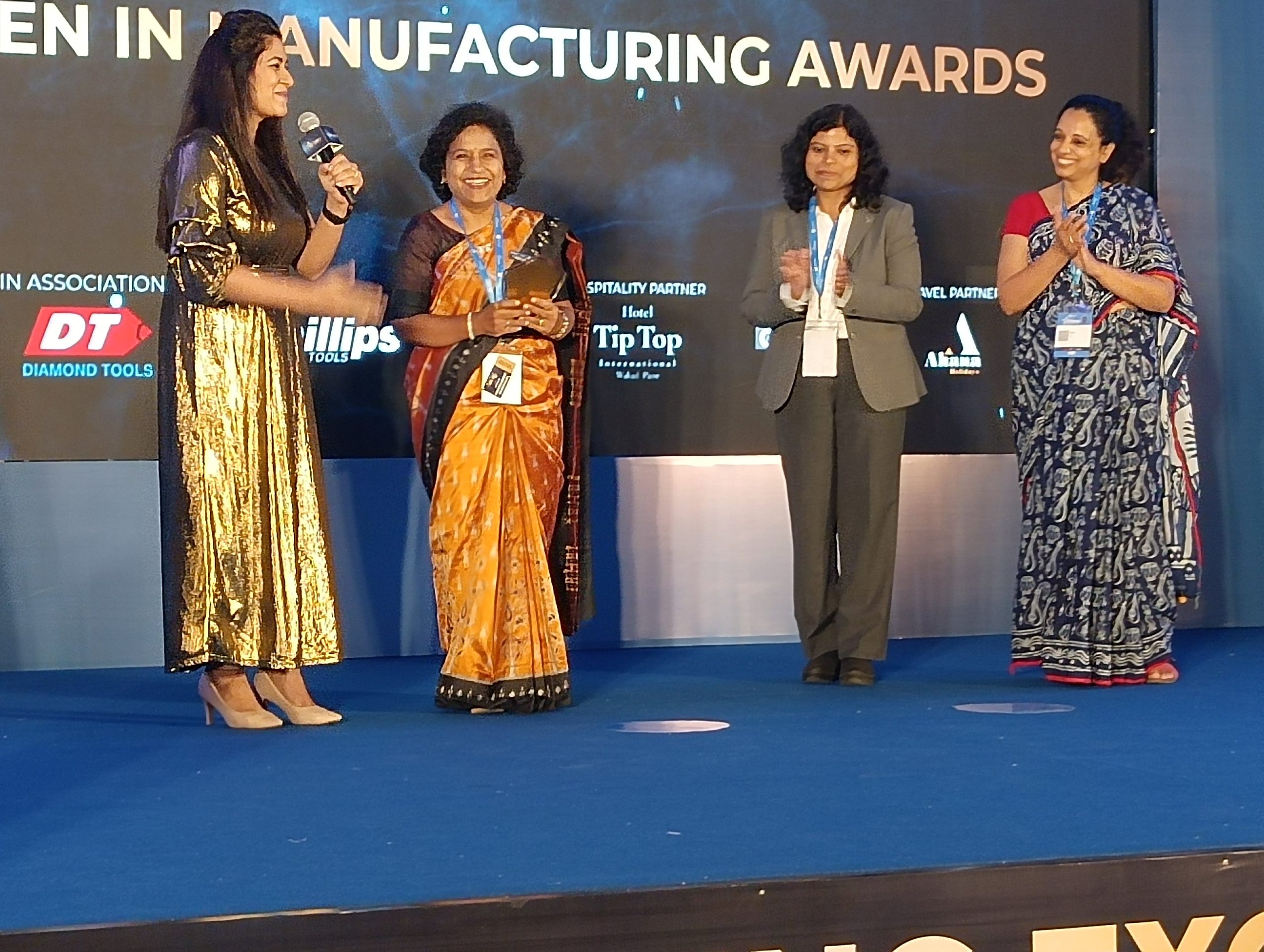 Suruchi Shanbhag receiving engineering excellence award